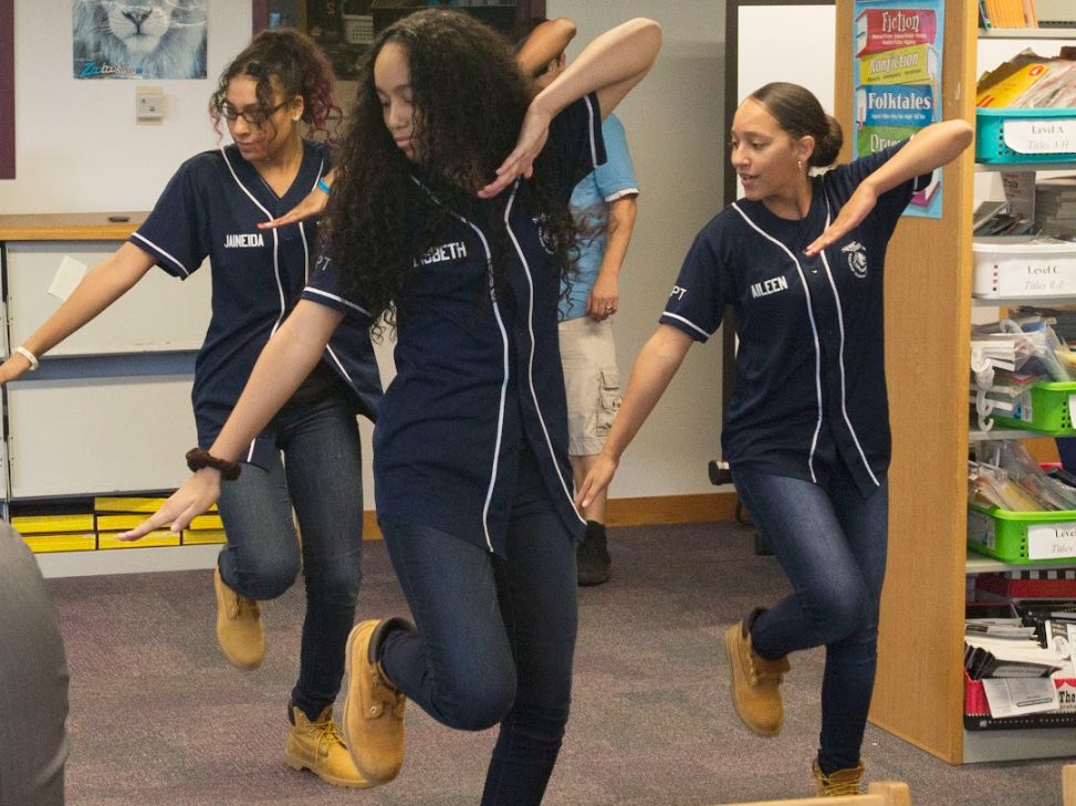 Spark Academy students moving in class